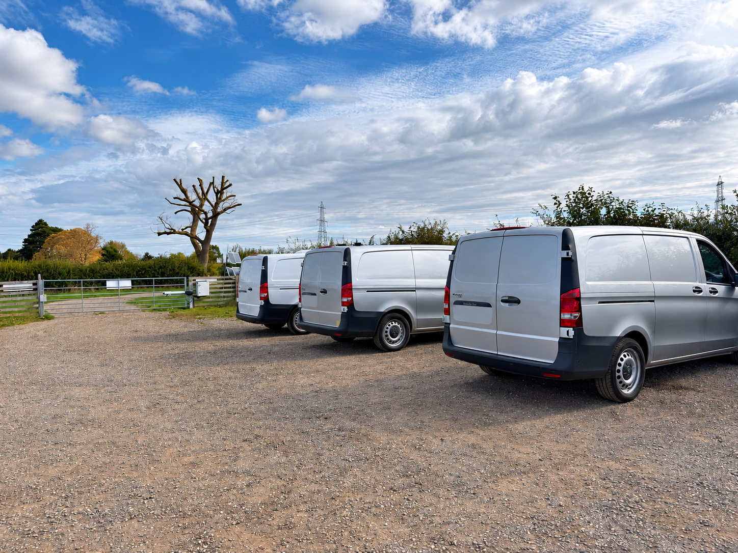 Doggy Paws dog walking vans at secure field in Peterborough